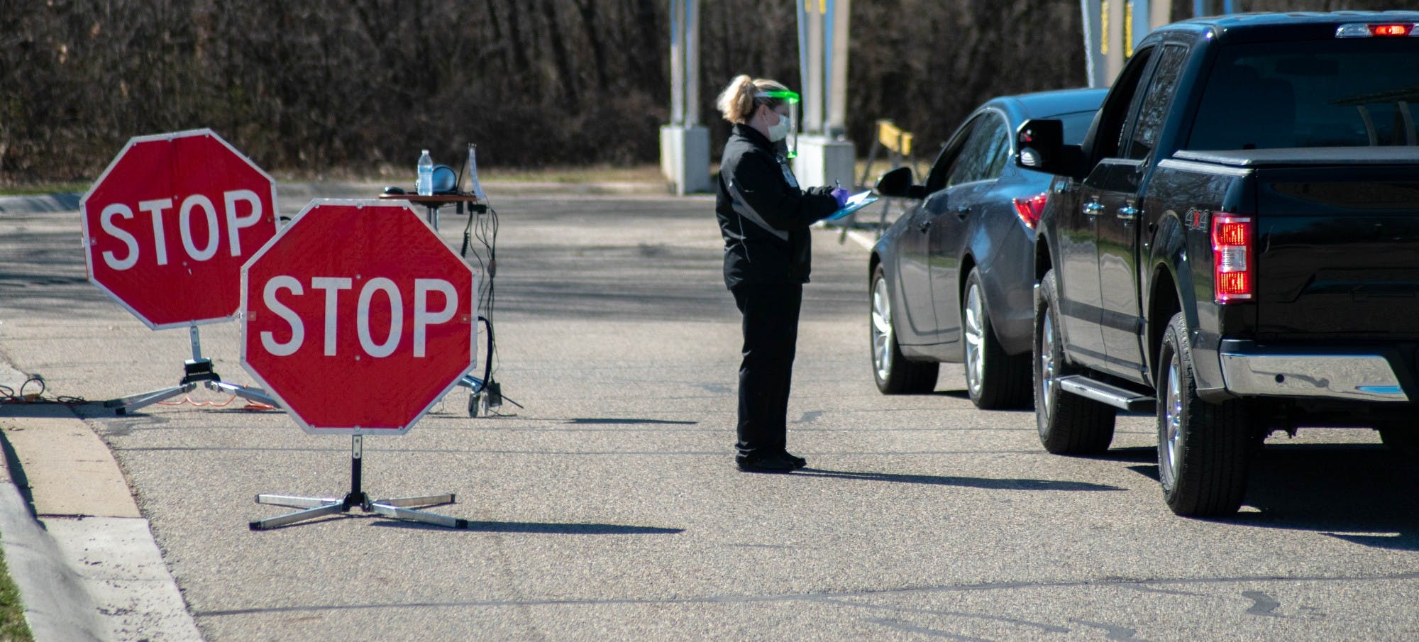 <p>Drive-through COVID-19 patients waiting to get through first stage of screening at Michigan State University&#x27;s drive-through testing site on April 2, 2020.</p>