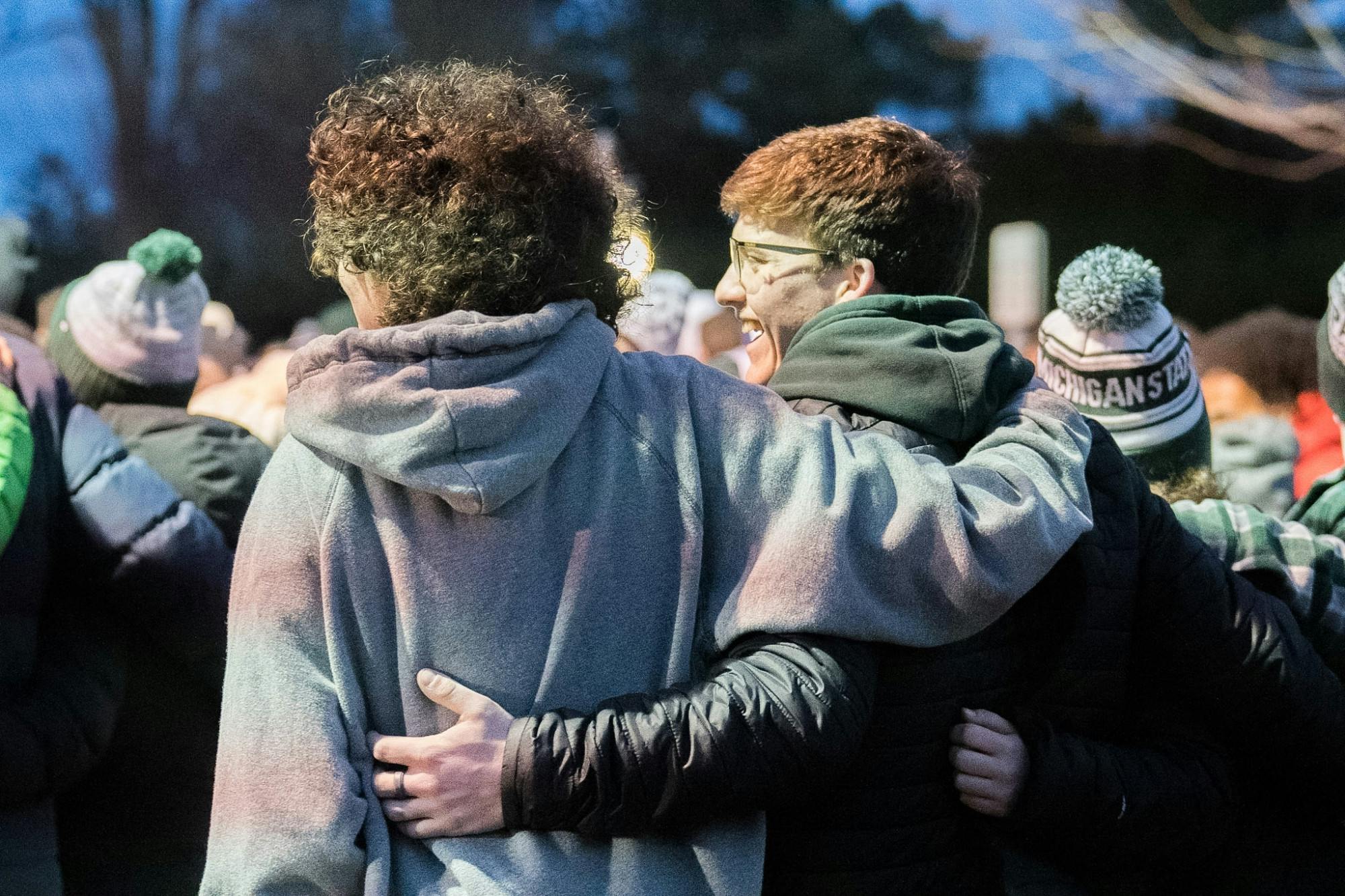 Crowds gather in mourning and support at the Student Led Candlelight Vigil on Feb. 21, 2023 outside the Fairchild Auditorium and The Rock. 