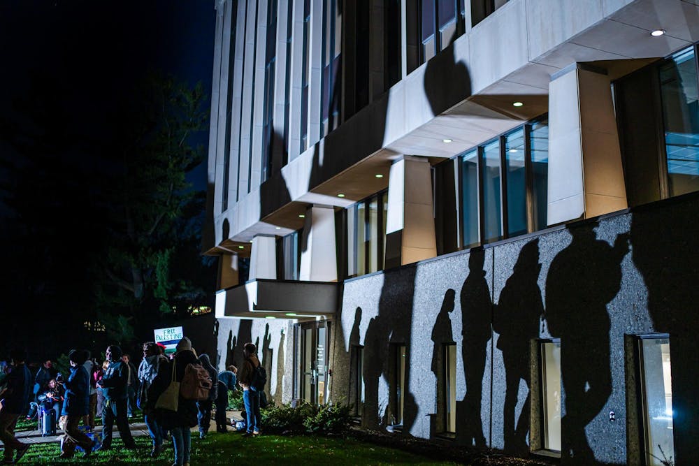 <p>Members of the Hurriya Coalition and Michigan State Sunrise protest outside of the Hannah Administration Building in East Lansing, Michigan on April 11, 2025. Members of MSU Sunrise and the Hurriya Coalition protested in the lobby where 19 protestors were arrested after multiple warnings from the police.</p>