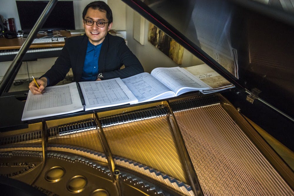 Professor Zhou Tian poses for a portrait in his studio on Jan. 18, 2018 at the Music Practice Building. Professor Zhou Tian was nominated for a 2018 GRAMMY Award for Best Contemporary Classical Composition for his "Concerto for Orchestra." (Nic Antaya | The State News)