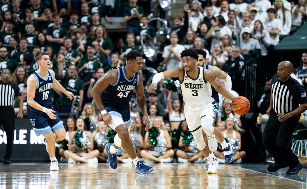 Sophomore guard Jaden Akins (3) dribbles the ball during a game against Villanova at the Breslin Center on Nov. 18, 2022. The Spartans defeated the Wildcats 73-71. 