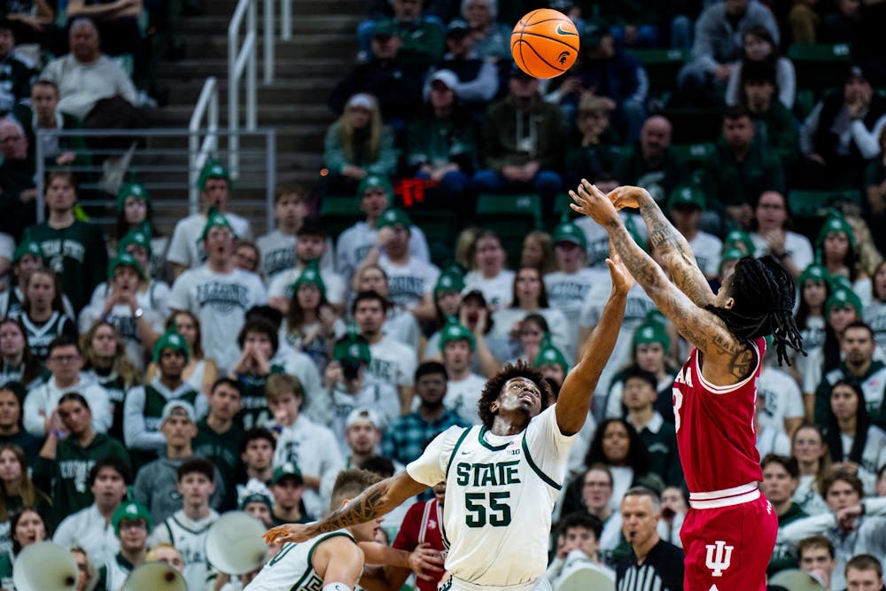 Indiana Hoosiers guard Tryce Grensing (18) attempts a shot during an NCAA Division I basketball game between Michigan State and Indiana at the Breslin Center in East Lansing, Michigan, on Tuesday, Jan. 13, 2026.