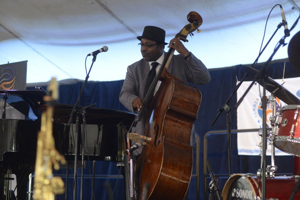 <p>Rodney Whitaker, director of Jazz Studies and artistic director for the Professors of Jazz at Michigan State University, performs with his group Soul-R-Engery during the East Lansing Summer Solstice Jazz Festival near Ann Street Plaza June 19th. 2015. Wyatt Giangrande/The State News</p>