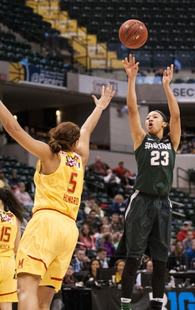 Junior forward Aerial Powers shoots the ball while being defended by Maryland center Malina Howard during the Big Ten Women’s Basketball Tournament championship game against the University of Maryland on March 6, 2016 at Bankers Life Fieldhouse in Indianapolis. The Spartans were defeated by the Terrapins, 60-44. 