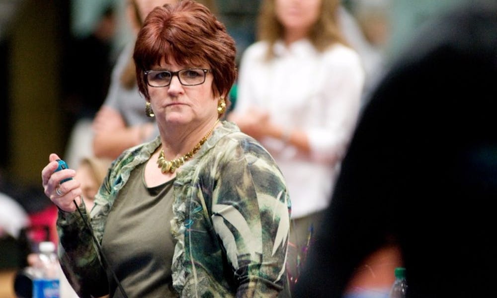 <p>Head coach Kathie Klages during a match. Klages was suspended from her role at MSU on Feb. 13 after a Jan. 31 motion alleged she discouraged a gymnast from reporting former MSU employee Larry Nassar's alleged sexual abuse. She retired on Feb. 14. Jaclyn McNeal/The State News</p>