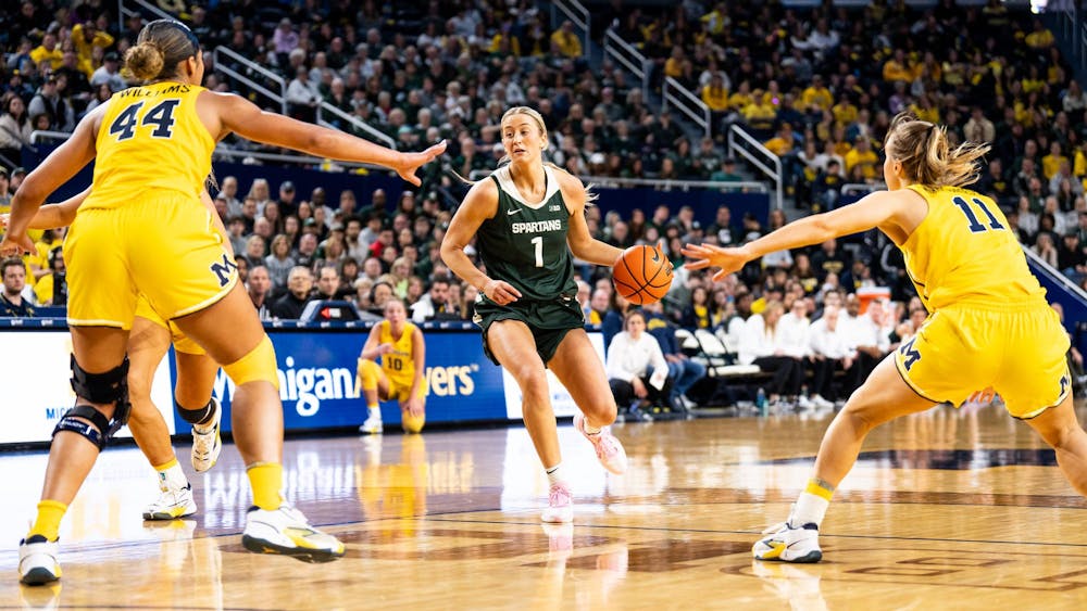 Michigan State graduate guard/forward No. 1 Tory Ozment drives the net at the Crisler center in Ann Arbor, Feb. 18, 2024. Michigan State secured a season sweep of the rival Wolverines, breaking a two-game losing streak in the process.