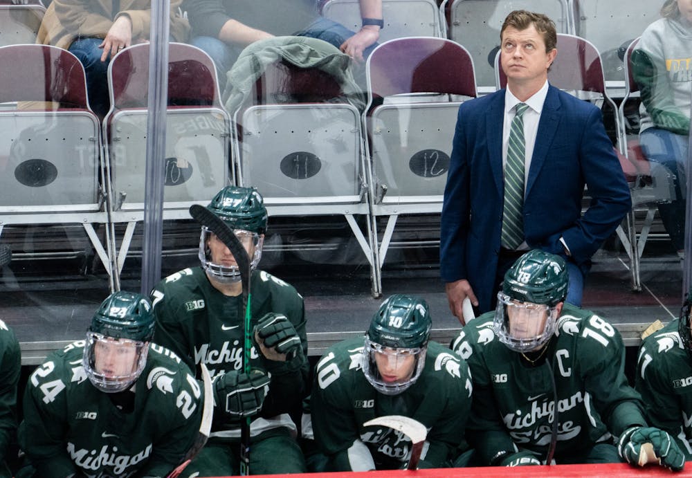 <p>MSU Hockey Head Coach Adam Nightingale looks up to the scoreboard during a game at Schottenstein Center on Jan. 7, 2023. The Spartans lost to the Buckeyes with a score of 6-0.</p>