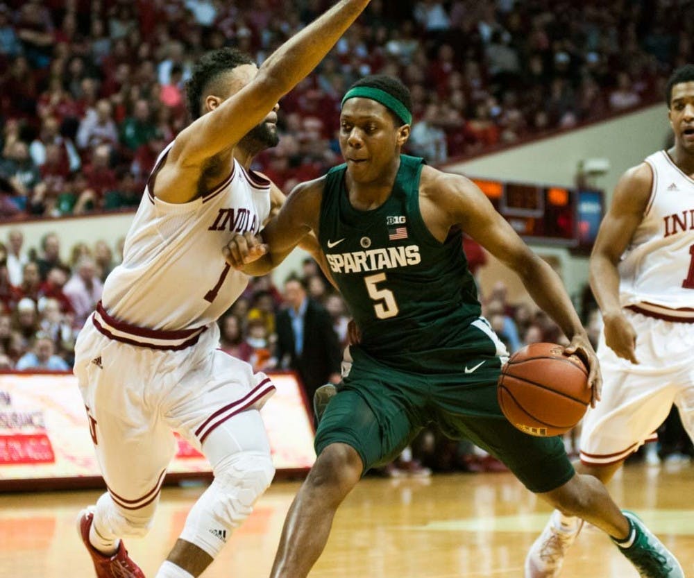 Freshman guard Cassius Winston (5) protects the ball from junior guard James Blackmon (1) during the second half of the men?s basketball game against Indiana on Jan. 21, 2017 at Assembly Hall. The Spartans were defeated by the Hoosiers, 75-82.