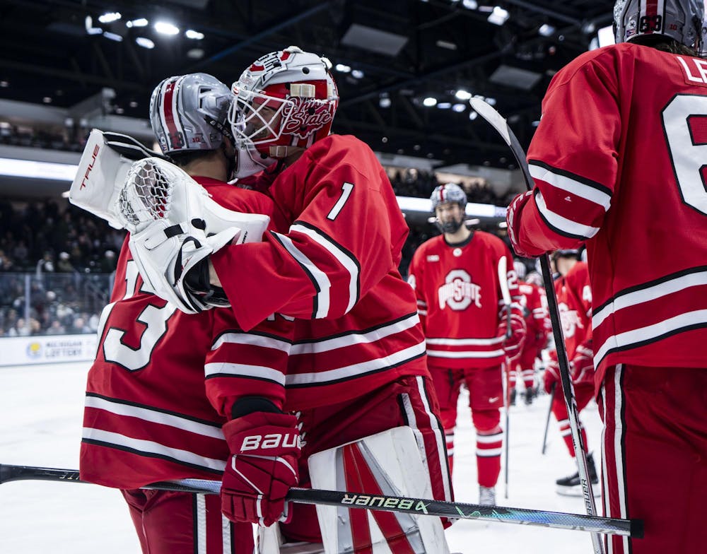 <p>OSU men’s hockey players celebrate after winning against MSU in the Munn Ice Arena on March 14, 2026. The Buckeyes beat the Spartans 3-2 after scoring in overtime.</p>