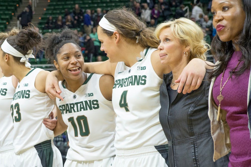 Sophomore guard Branndais Agee, 10, reacts to a comment by graduate student center Jasmine Hines, 4, on Jan. 10, 2016 during the game against Northwestern at Breslin Center. The Spartans defeated the Wildcats, 74-51.