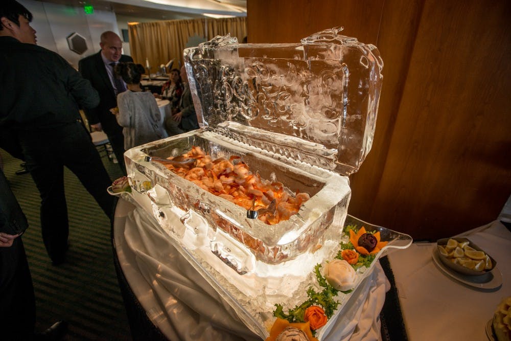 An ice sculpture filled with shrimp is pictured during the Les Gourmets event on April 8, 2017 at Huntington Club, located on the fourth floor of Spartan Stadium. Les Gourmets is an annual banquet put on by hospitality students.