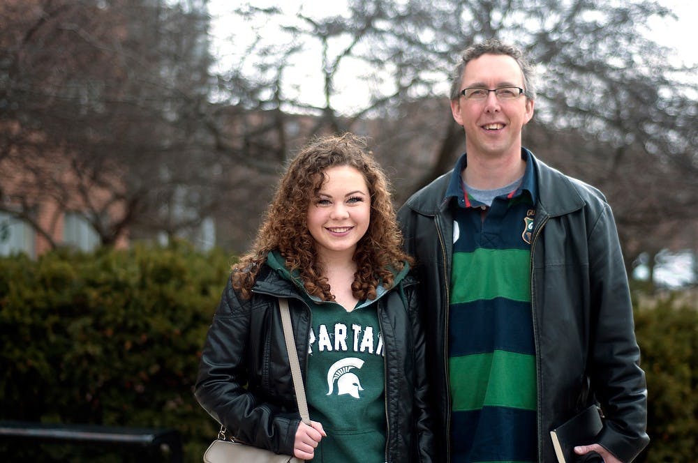 <p>Grand Rapids resident and MSU alumnus Jeff Reava and his daughter Abigail Reava pose for a portrait April 7, 2015, outside Wilson Hall. Abigail Reava said she will be attending MSU in the fall and was spending the day touring dorms. Kelsey Feldpausch/The State News </p>