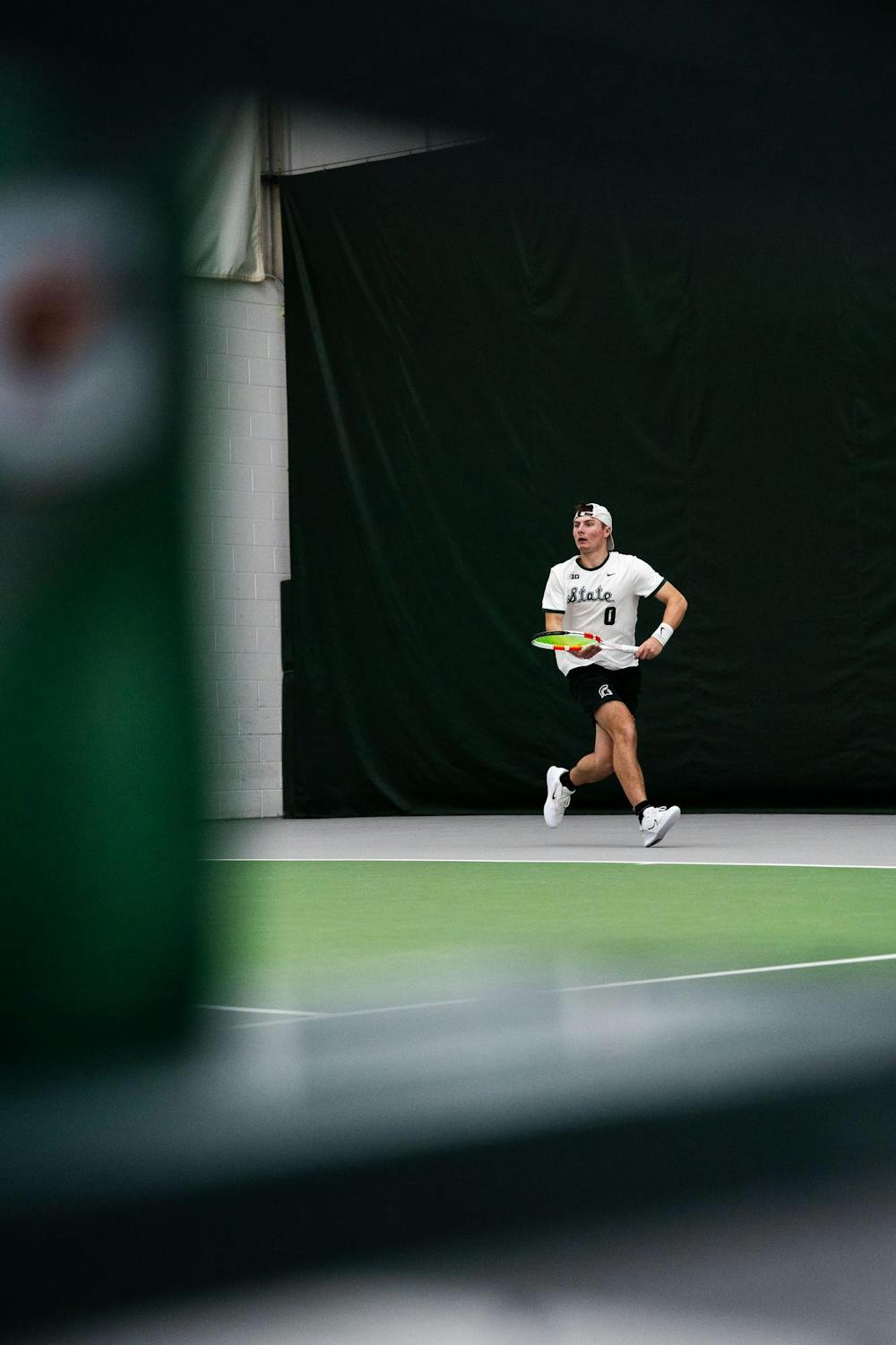 <p>Michigan State freshman Mitchell Sheldon (0) competes during a match at the MSU Tennis Center on March 29, 2025. Michigan State won against Penn State, 4-2.</p>