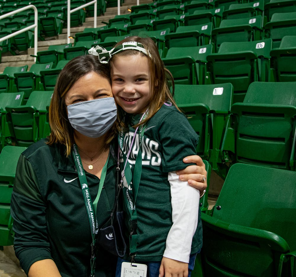 <p>Pamela and Cecelia Jones pose for a portrait at Michigan State&#x27;s women&#x27;s basketball game against Notre Dame on Dec. 2, 2021.</p>