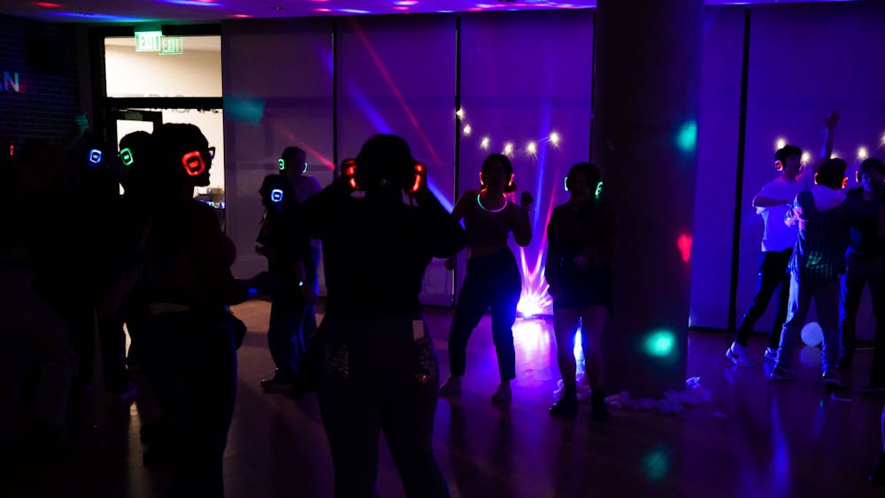 <p>Students enjoying a silent disco at the Wharton Center, hosted by Wharton Center Students on Jan. 27, 2023.</p>