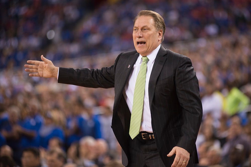 <p>Head coach Tom Izzo yells to his players on the court April 4, 2015, during the semi-final game of the NCAA Tournament in the Final Four round at Lucas Oil Stadium in Indianapolis, Indiana. The Spartans were defeated by the Blue Devils, 81-61. Erin Hampton/The State News</p>