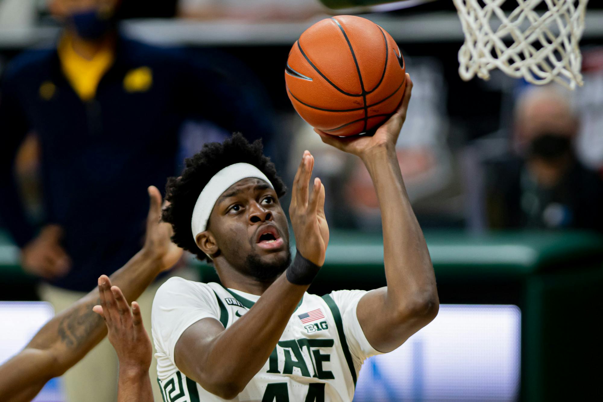 <p>Junior guard Gabe Brown (44) shoots a layup during the Spartans&#x27; upset against No. 2 Michigan on March 7, 2021</p>