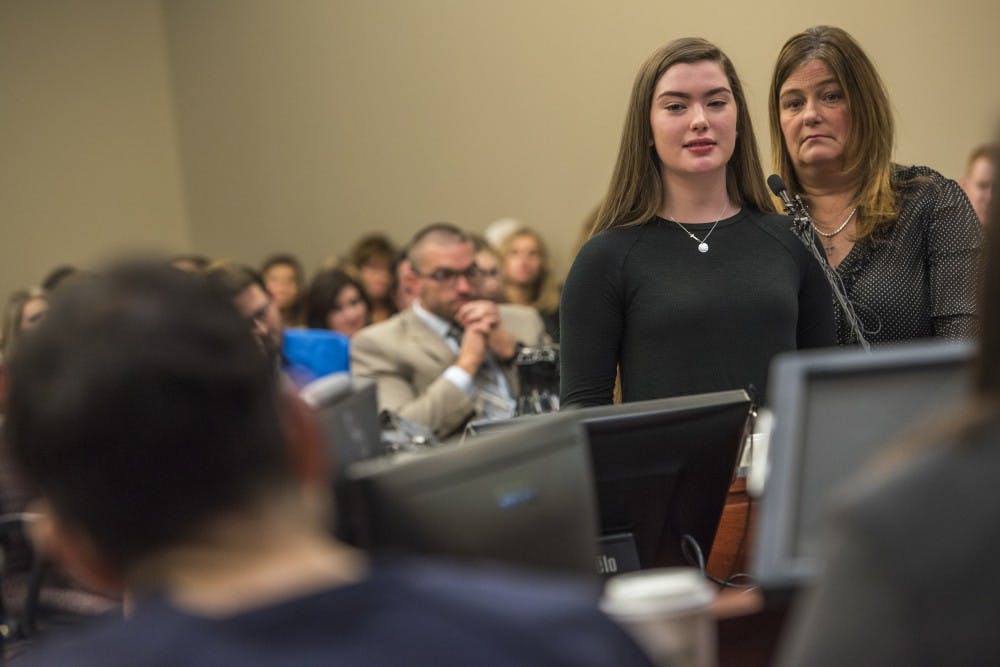 <p>Emma Ann Miller, 15, and her mother, Leslie Miller, look towards Ex-MSU and USA Gymnastics Dr. Larry Nassar during Emma's statement on the fifth day of Nassar's sentencing on Jan. 22, 2018 at the Ingham County Circuit Court in Lansing. "Just remember Larry, it's never too late to do the right thing," Emma Ann said.&nbsp;</p>
