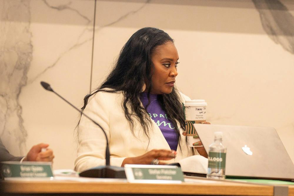 <p>MSU Trustee Rema Vassar looks at a speaker during the MSU Board of Trustees meeting in East Lansing, Mich., on Sept. 11, 2026.</p>