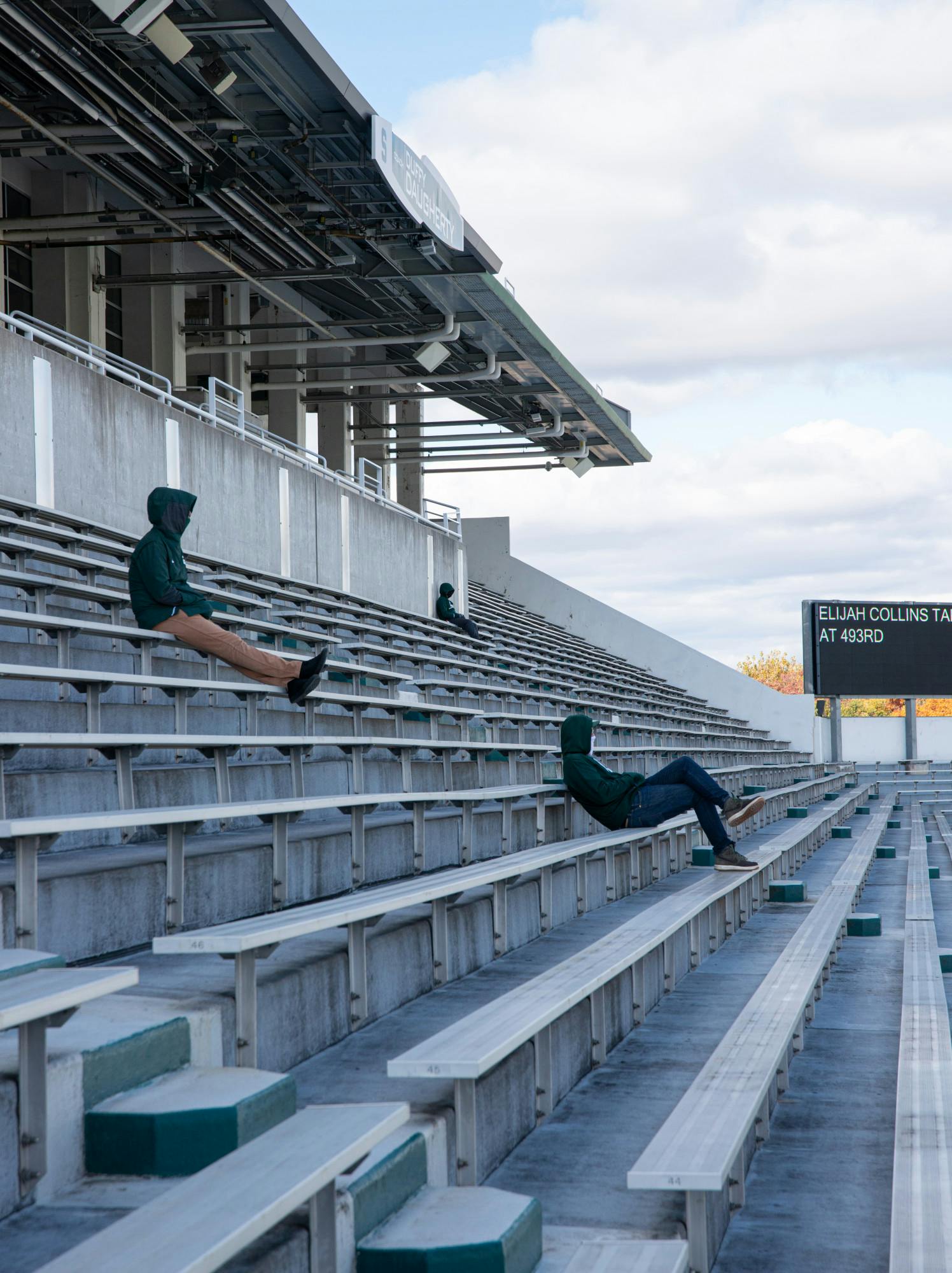 <p>Fans socially distance at Spartan Stadium on Oct. 24, 2020, during a football game against Rutgers.</p>