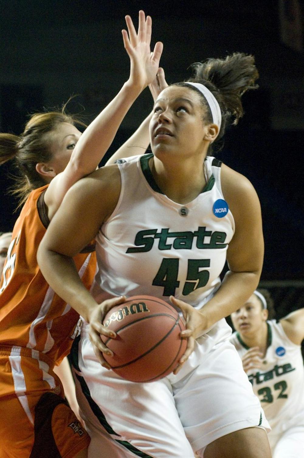 Senior center Lauren Aitch looks up toward the basket over Bowling Green center Chelsea Albert before shooting Saturday in MSU's first-round NCAA Tournament game in Louisville, Ky. Aitch had 10 points in MSU's 72-62 victory over Bowling Green.