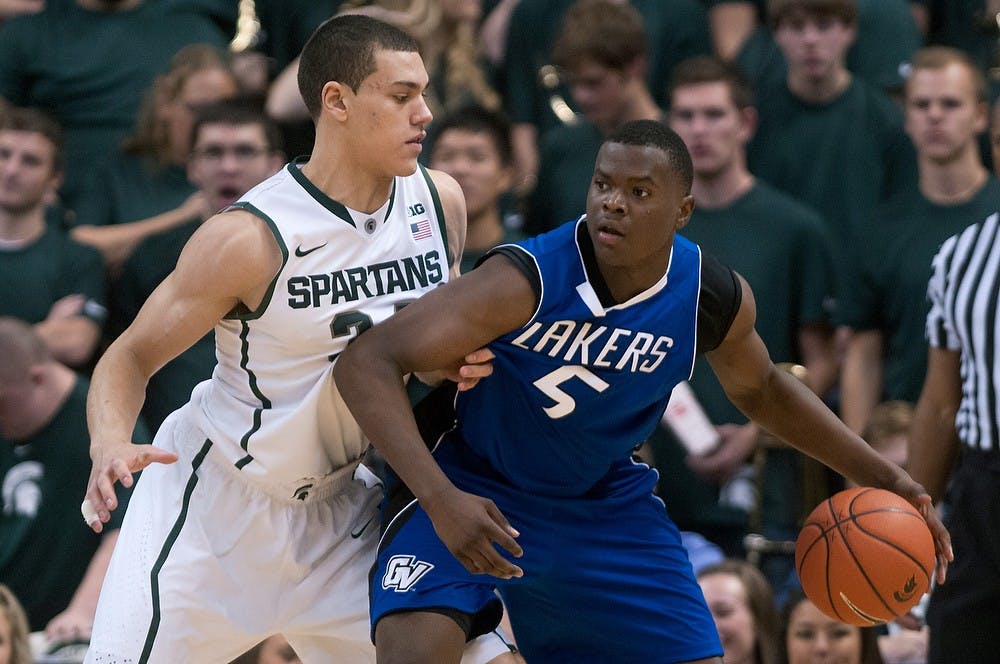 	<p>Freshman forward Gavin Schilling guards Grand Valley State forward Trevin Alexander on Oct. 29, 2013, during the game at Breslin Center. <span class="caps">MSU</span> defeated the Lakers, 101-52. Julia Nagy/The State News</p>