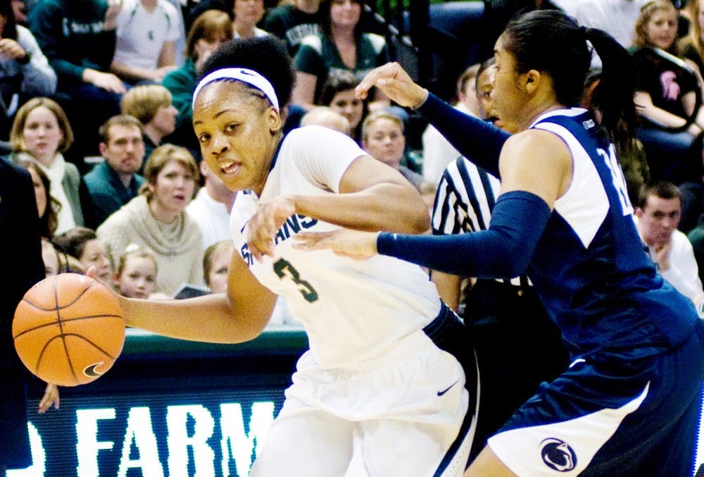 Senior guard Porsch? Poole looks to drive past Penn State junior guard Alex Bentley Sunday afternoon at Breslin Center. Poole was 50 percent behind the three-point line in the 83-77 MSU victory over Penn State. Jaclyn McNeal/The State News