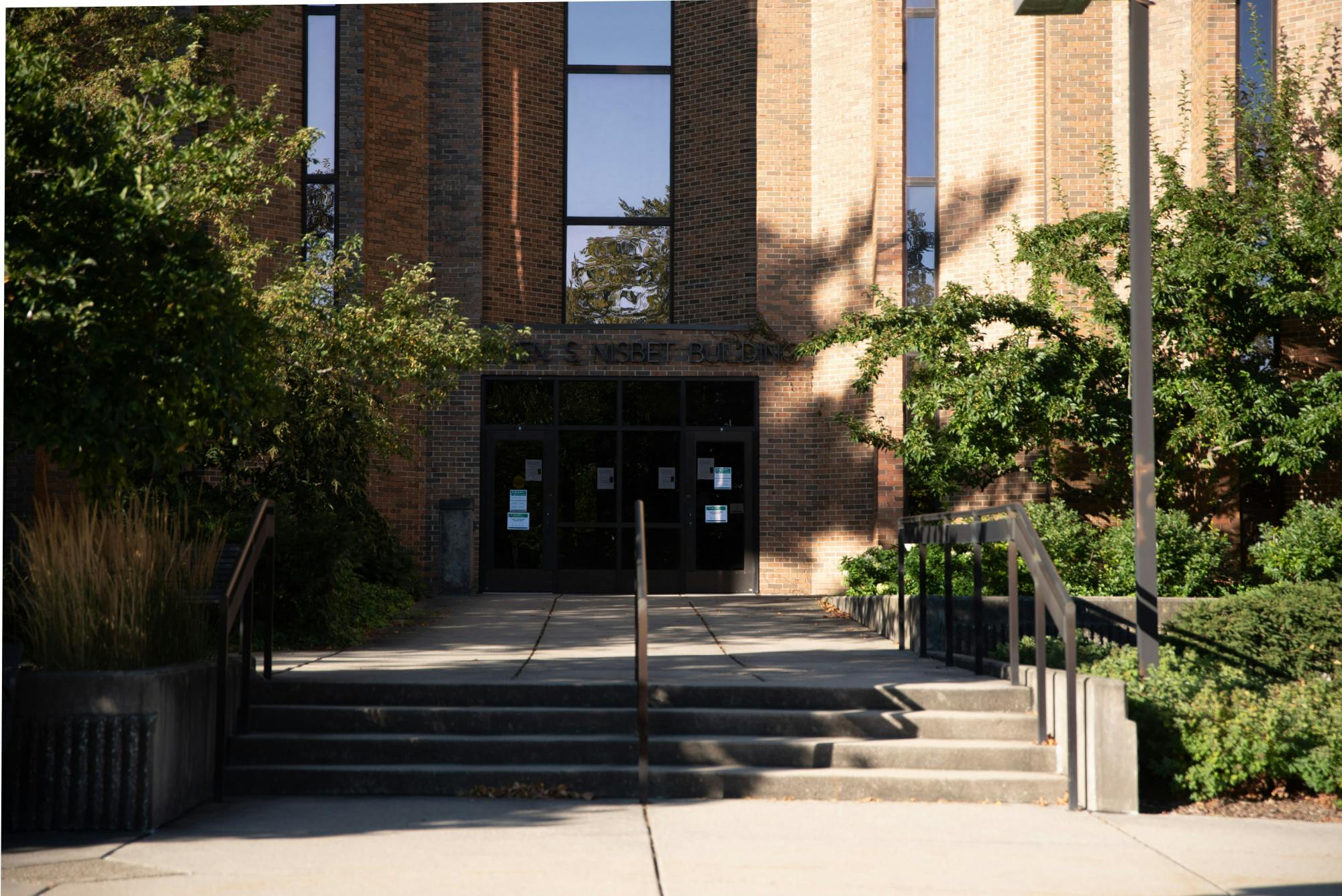 <p>Front doors of Michigan State University&#x27;s Nisbet Human Resources Building on Friday, September 4, 2020.</p>