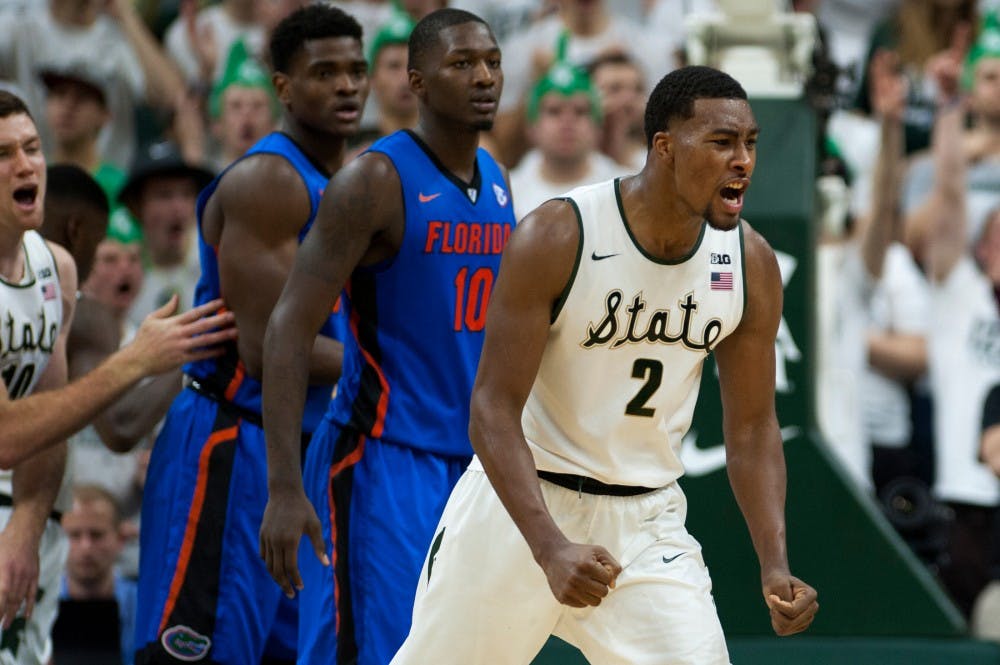 Sophomore forward Javon Bess celebrates after he scores during the game against Florida on Dec. 12, 2015 at Breslin Center. The Spartans defeated the Gators, 58-52.