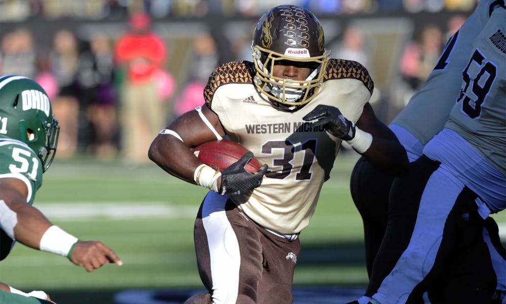 <p>Western Michigan running back Jarvion Franklin makes his way down the field during the game against Ohio University on Oct. 25, 2014, at Waldo Stadium at Western Michigan in Kalamazoo, Mich. </p>