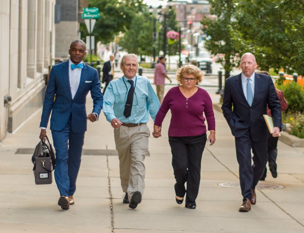 <p>Ex-MSU gymnastics coach Kathie Klages walks into the Lansing Police Department as she turns herself in to authorities on Aug. 30, 2018 at Lansing Police Department.</p>