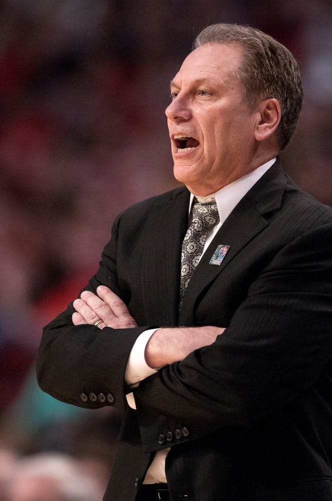 	<p>Men&#8217;s basketball head coach Tom Izzo yells to his players during the second round of the Big Ten Tournament against Iowa on March 15, 2013, at United Center in Chicago, Ill versus Iowa. Natalie Kolb/The State News</p>
