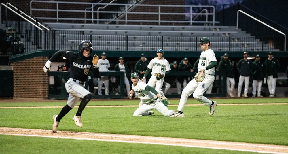 <p>MSU junior Andrew Carson makes an amazing groundball catch and rushes to throw it to first base during the matchup against Oakland, April 19, 2022. </p>