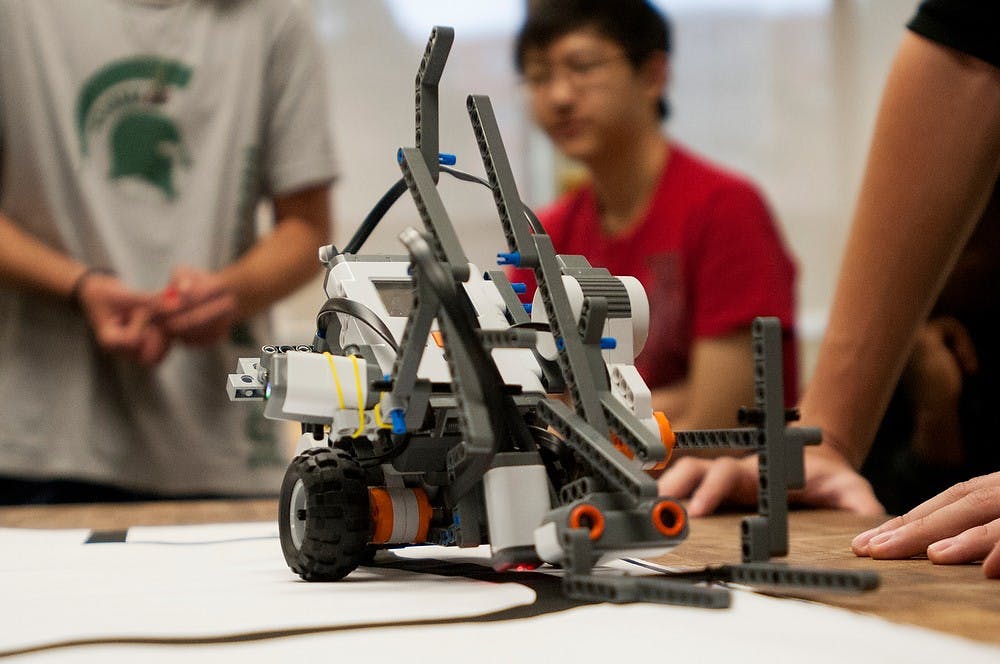 <p>A robot performs the task of navigating a course Oct 3, 2014, in Wilson Hall. It was a six week long project for the EGR 100 Lab. Dylan Vowell/The State News</p>