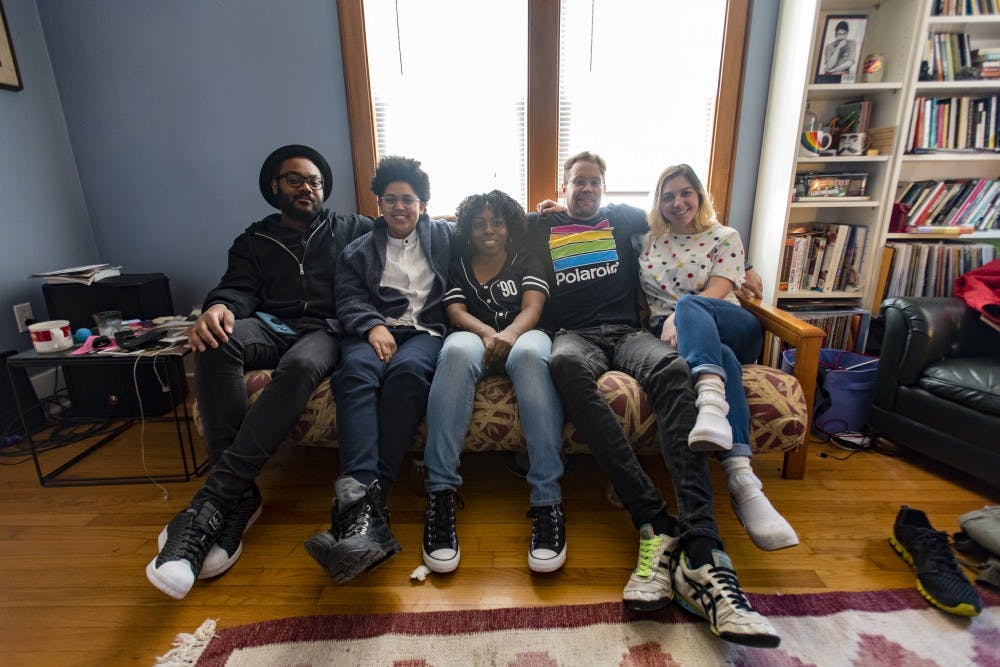 From left to right, Lansing resident Mimi Fisher, jazz studies senior Dakota Peterson, East Lansing resident Ashlie Fisher, Lansing resident Dru Seymour, and Lansing resident Jolyse Race pose for a group picture on March 23, 2017 in Lansing.