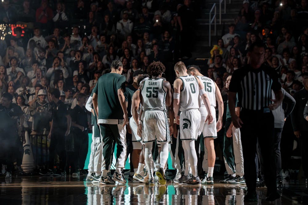 Michigan State huddles up prior to their game against Detroit Mercy at the Breslin Center in East Lansing, Mich., on Friday, Nov. 21, 2025.