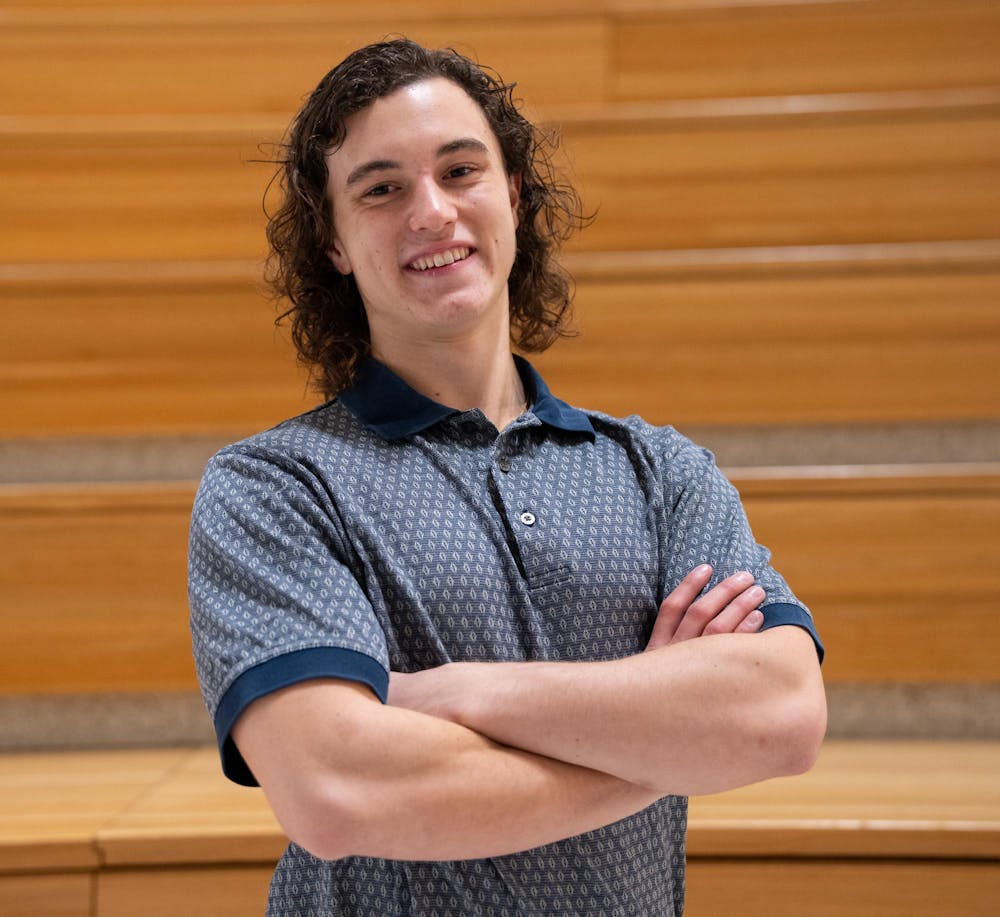 Neuroscience junior and founder of "Nourish U" Jonathan Dziwanowski poses for a portrait at the Eli Broad College of Business on Dec. 3, 2023. 