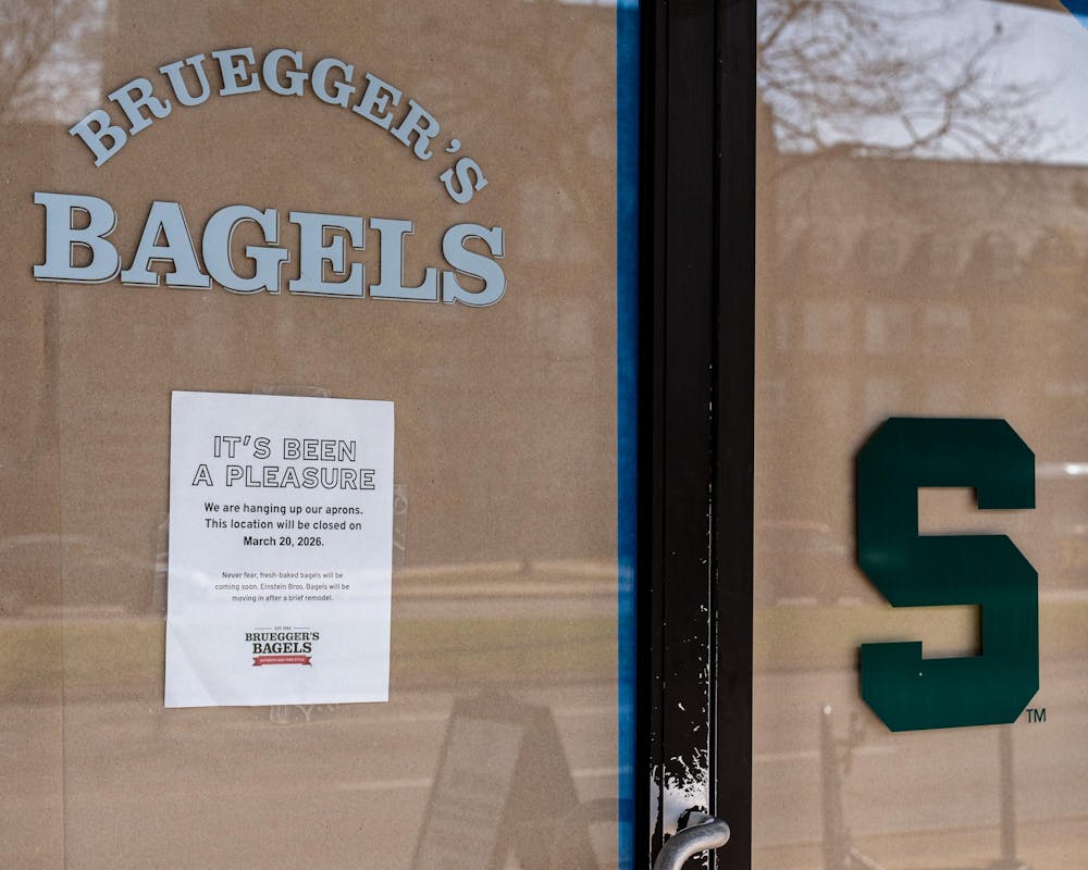 <p>Brueggers Bagels front door has a sign notifying the public of its closing on Grand River Ave. in East Lansing, MI on March 25, 2026.</p>