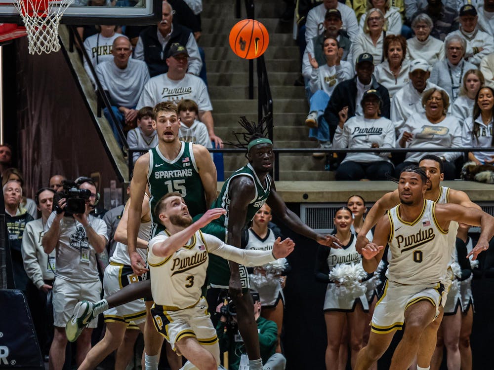 Michigan State sophomore guard Kur Teng (2) launches the ball into the air vs. Purdue University at Mackey Arena in West Lafayette, Indiana on Thursday, Feb. 26, 2026. 