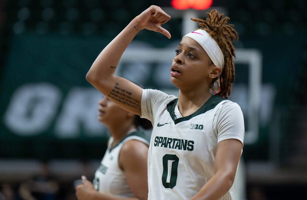 <p>MSU guard DeeDee Hagemann signals a swap to a teammate lined up along the free throw lane at the Breslin Center in East Lansing on Wednesday, Feb. 22, 2023. Hagemann has totaled 224 points across 26 games played for the Spartans.</p>