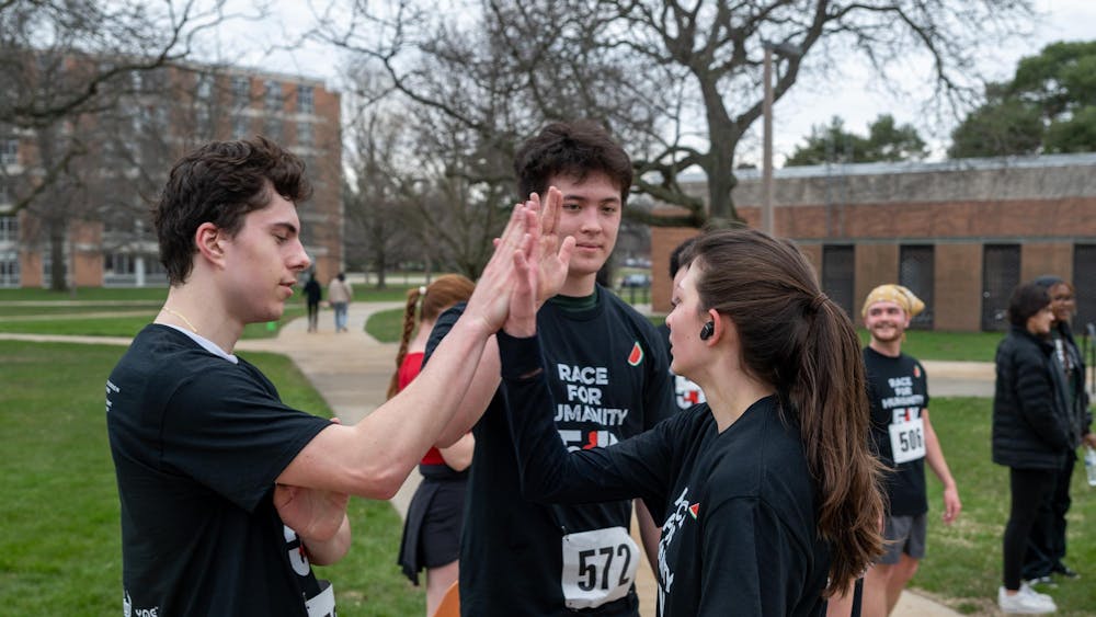<p>Participants congratulate each other after the Race For Humanity on April 13, 2025.</p>