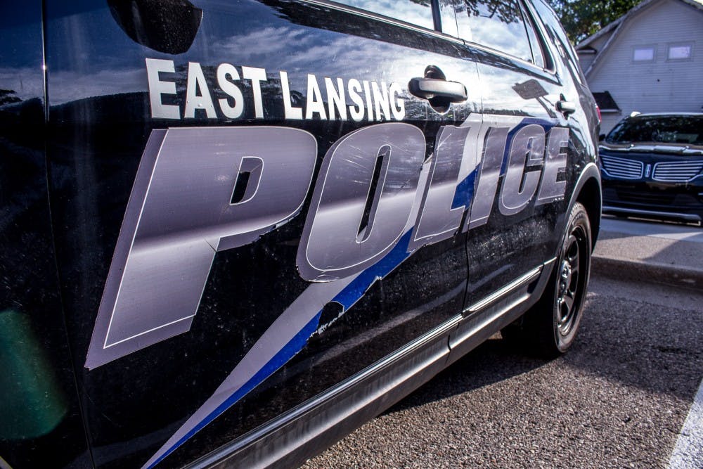 A police car parked outside of 54-B District Court in East Lansing.