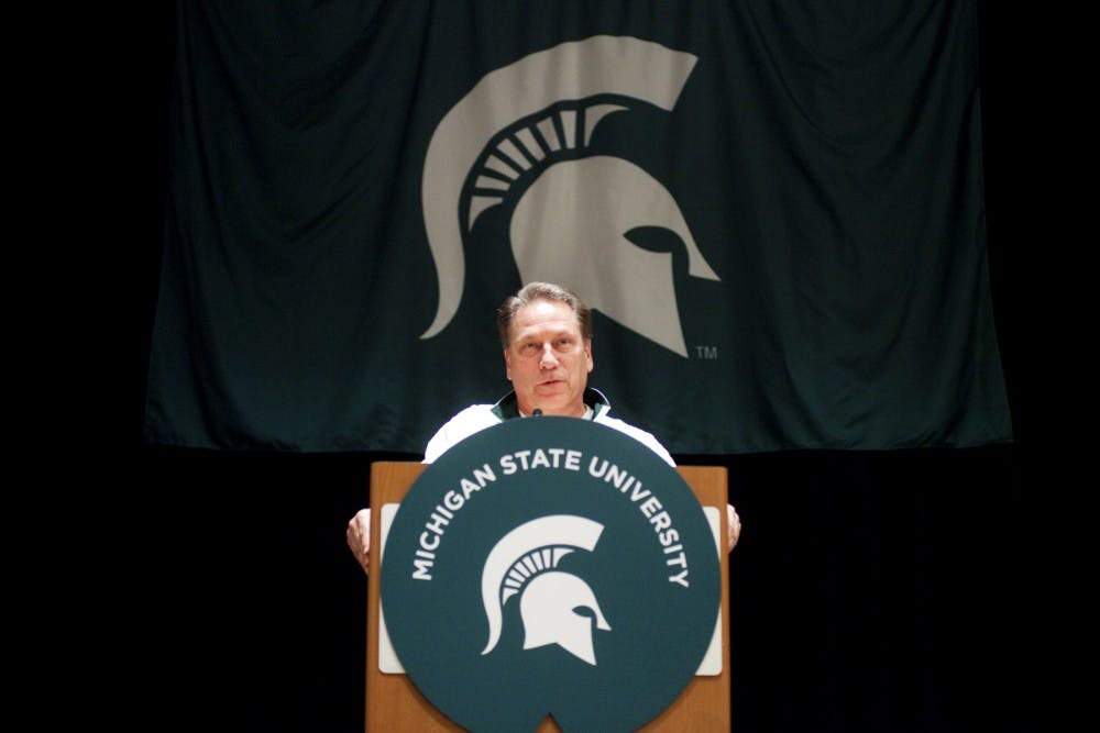 Basketball head coach Tom Izzo addresses the crowd Thursday night at the Sheraton Phoenix Downtown Hotel in Pheonix, Arizona. The pep rally brought out alumni to build excitment before men's basketball team plays Louisville. Matt Hallowell/The State News