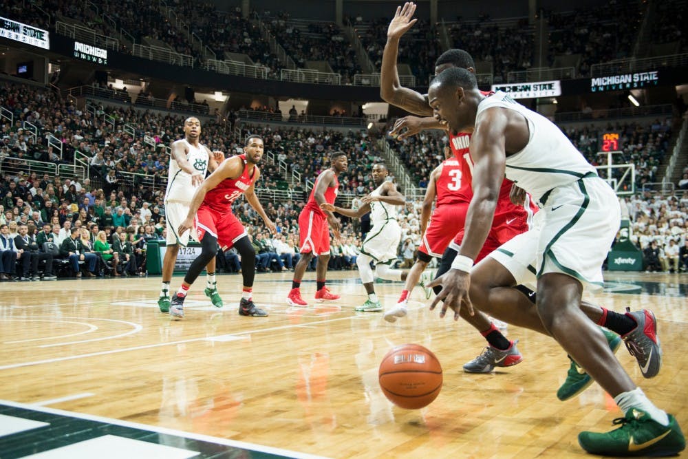 Freshman guard Joshua Langford (1) blocks as he drives toward the basket during the second half of the men's basketball game against Ohio State University on Feb. 14, 2017 at Breslin Center. The Spartans defeated the Buckeyes, 74-66.