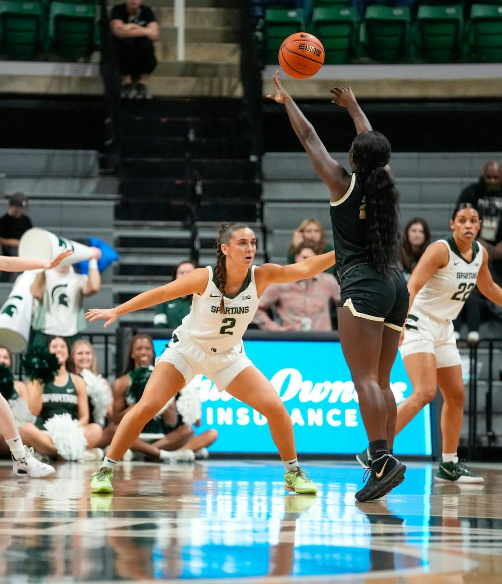 <p>Sophomore, Abbey Kimball defends opponent from scoring during their matchup against Oakland University at the Breslin Center on Nov. 8, 2023.</p>