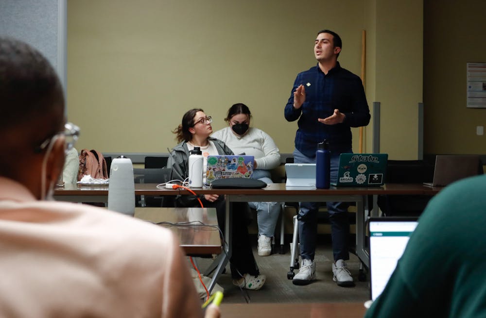 <p>Michigan State ASMSU member Alan Saleh helps clear up questions during a discussion on the future budget.  The ASMSU Elections were held in the Student Services Building Conference Room, on April 20, 2022, with Michigan State Junior Jordan Kovach becoming the next ASMSU President.</p>