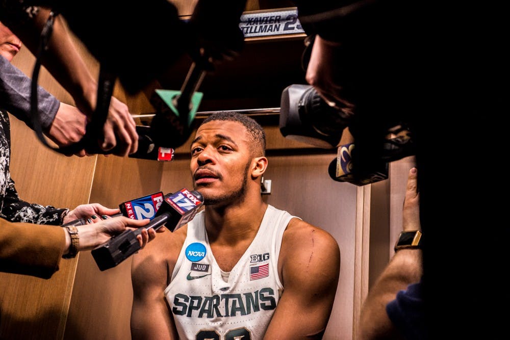 <p>Freshman forward Xavier Tillman (23) addresses the media after the game against Syracuse on March 18, 2018 at Little Caesars Arena in Detroit. The Spartans fell to the Orange, 55-53 ending their NCAA journey.&nbsp;</p>