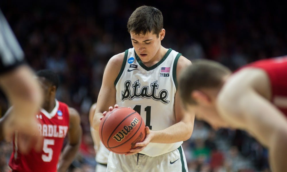 Red shirt junior guard Conner George (41) takes a free throw during the NCAA tournament game against Bradley at Wells Fargo Arena March 21, 2019. The Spartans defeated the Braves, 76-65.