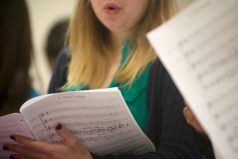 	<p>Spanish senior Sarah Greer sings during a Women&#8217;s Glee Club practice Feb. 5, 2014, at the Music Practice Building. There are 74 women in the class. The club technically is a class, but can be taken multiple times. Julia Nagy/The State News</p>
