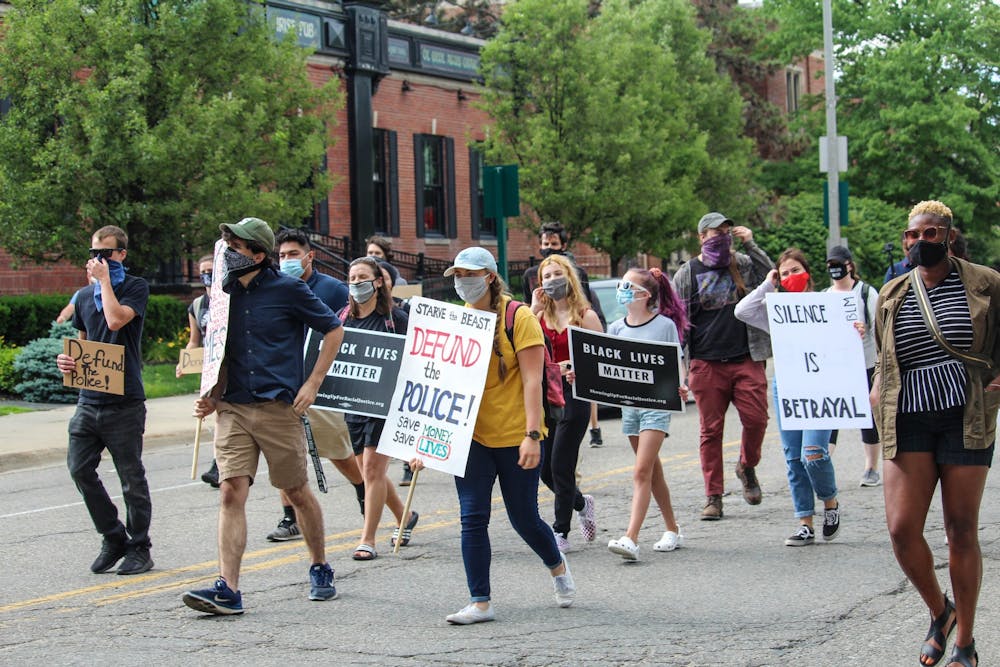 <p>People march from ELPD to Cowles House demanding accountability from MSU on June 24, 2020.</p>